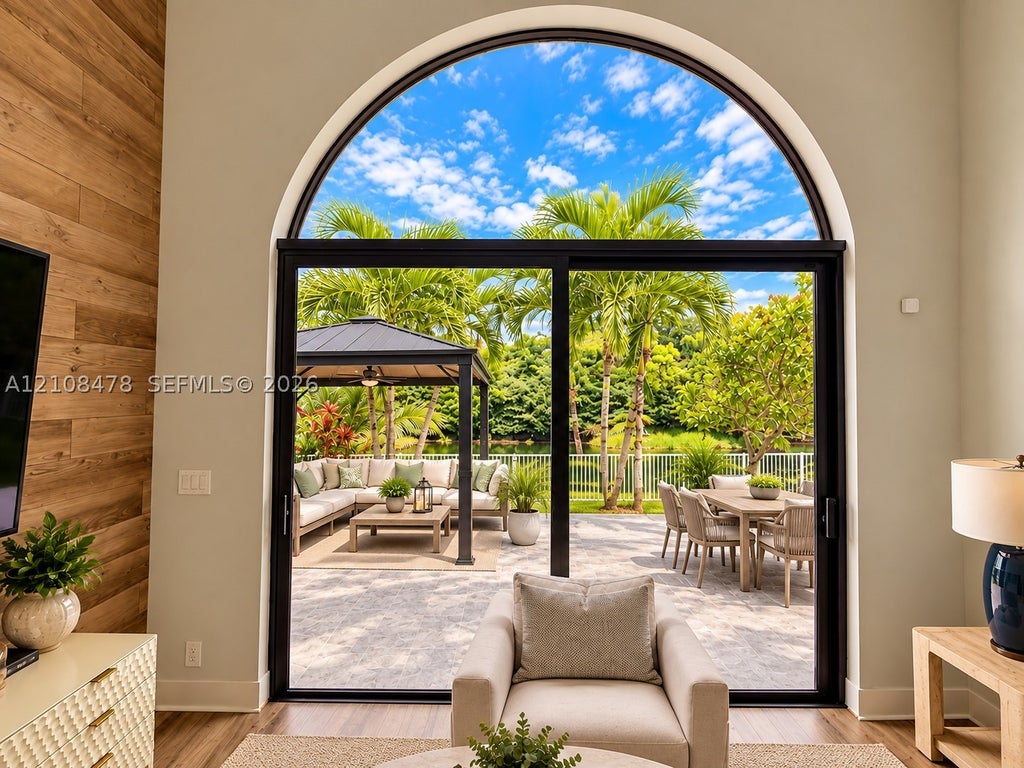 Photo of 2233 NW 162nd Ter, Pembroke Pines, FL 33028 (MLS # A12108478)