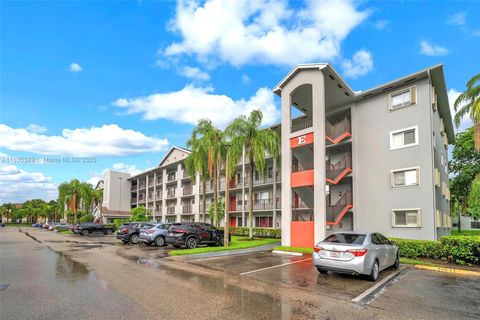 Photo of 801 SW 138th Ave #103E, Pembroke Pines, FL 33027 (MLS # A11835389)