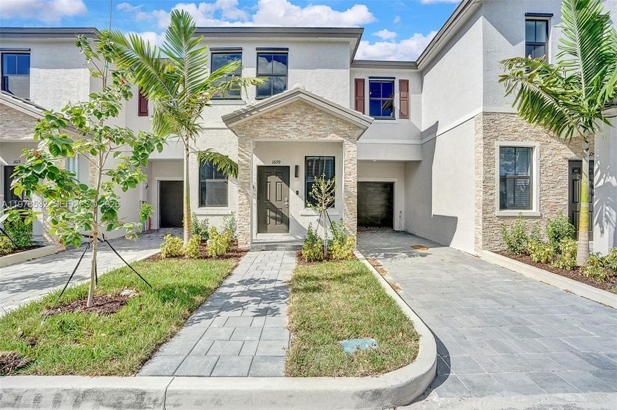 Modern 3Bd/2.5Bth townhouse with a one car garage. Bright, spacious rooms including an open concept main floor, a kitchen with stainless steel appliances, rich cherry mahogany colored cabinets and elegant granite counter tops. The main floor is tastefully tiled and low maintenance lvt flooring leads you upstairs to 3 bedrooms, large walk-in closets, and a laundry area. The Edge on 15th is a gated community with a beautiful pool.