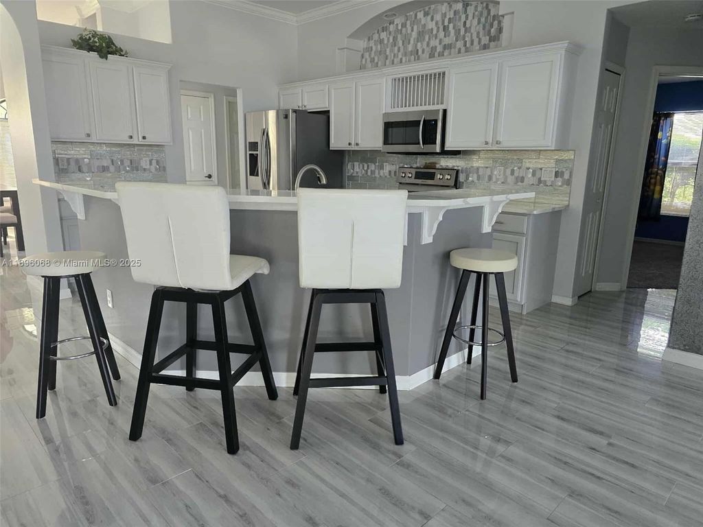 Photo of 3401 SW San Benito St, Port St Lucie, FL 34953 (MLS # A11896068)