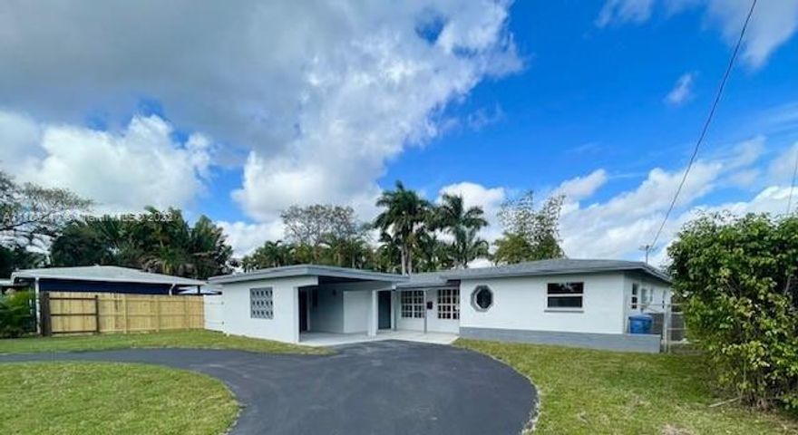 Beautiful 3/2 FULLY REMODELED single family home in Oakland Park. This home is located on a large lot and offers a spacious layout in a very convenient location. More than 1600 sq. ft of living space!
Amazing open floor plan with plenty of closet space throughout. Modern Kitchen with black stainless steel appliances and new cabinets. New roof with permits. Bathrooms are COMPLETELY REMODELED. New floors. Newer water heater and AC. Master bedroom with ensuite. Large fenced in backyard perfect for entertaining and BBQs. Freshly painted inside and out. Circular Driveway and Finished Carport great for storage. 
This home is conveniently located just minutes from major roadways, shopping, dining, and more!