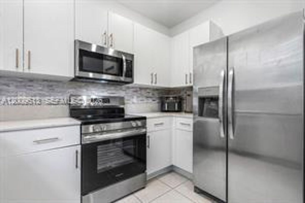 Photo of 2781 NW 55th Way, Lauderhill, FL 33313 (MLS # A12009613)