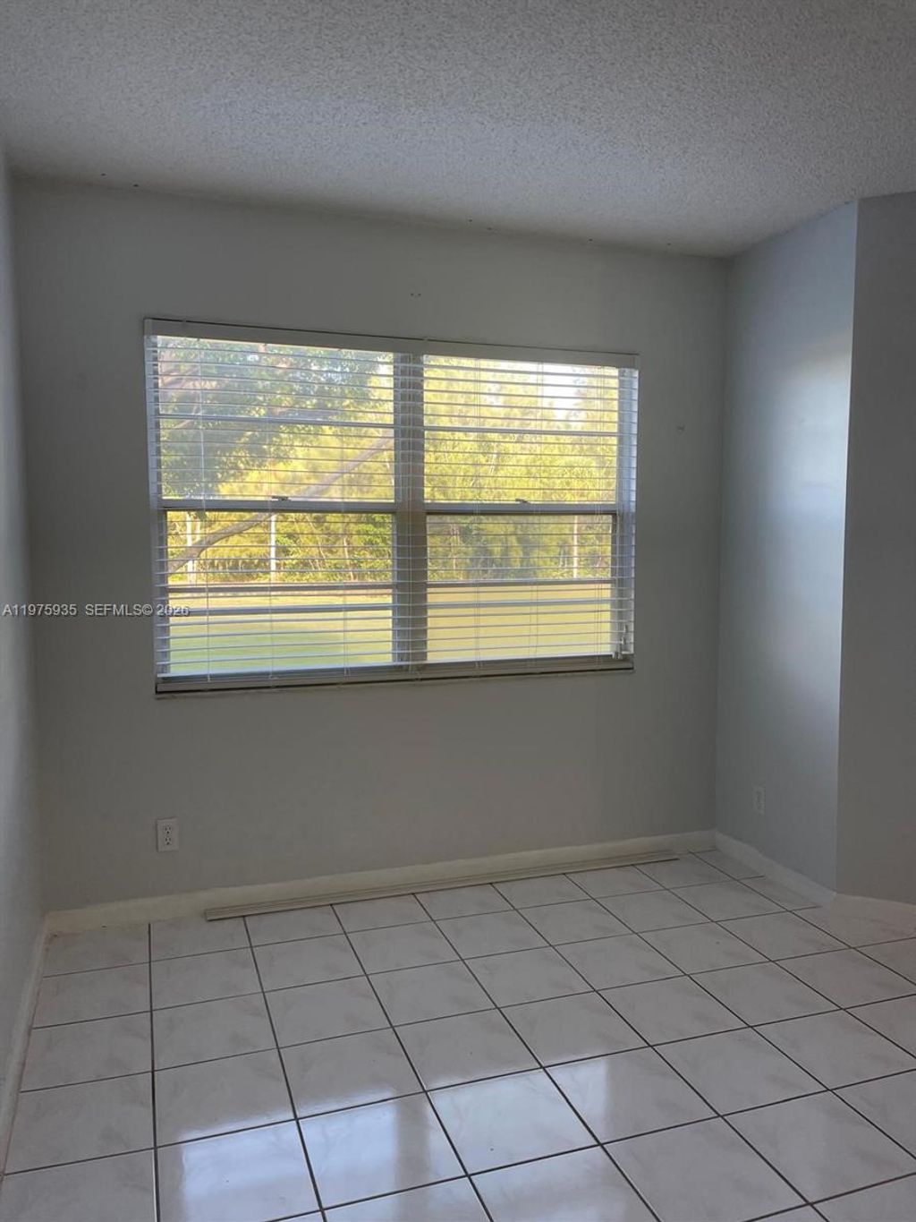 Photo of 1110 SW 125th Ave #202M, Pembroke Pines, FL 33027 (MLS # A11975935)