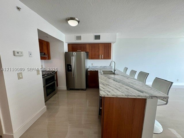 9499 Collins Ave 911