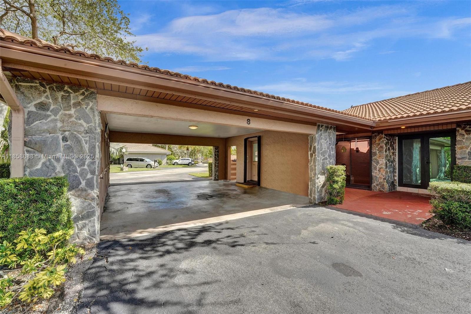 This Villa is not only the largest model but one of the few original 3-bed, 3-bath layouts in the community. Inside, you’ll find a beautifully designed kitchen featuring high-end appliances, custom cabinetry, and granite countertops. The spacious great room offers soaring ceilings, modern LED lighting, and an open, inviting atmosphere ideal for hosting guests. The primary suite boasts wood floors, large walk-in closet, spacious shower and a double-sink vanity. Step outside to enjoy a large, private patio which provides ample space for outdoor activities. Includes an expansive circular driveway and two-vehicle carport offer parking for up to six cars. The Villa Residences is a secure, and gated community with 80 detached villas situated in the heart of Emerald Hills.