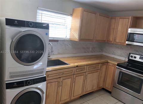 Photo of 4235 N University Dr #306, Sunrise, FL 33351 (MLS # A12061384)