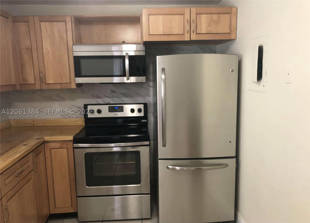 Photo of 4235 N University Dr #306, Sunrise, FL 33351 (MLS # A12061384)