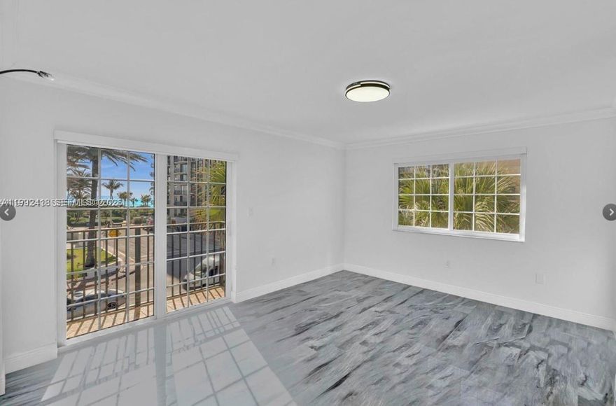 Steps from the beach in Surfside, this beautifully renovated boutique condo offers stunning ocean views from both bedrooms, impact windows, modern finishes, in-unit washer/dryer, and garage parking. Enjoy secured entry, elevator, pool, low maintenance fees, and easy walk to the Surf Club, parks, tennis, and dining.