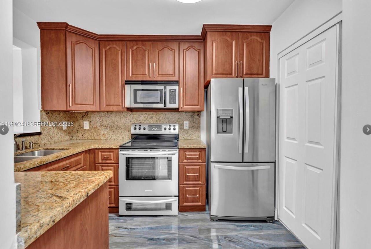 BEACH POINT CLUB CONDO - Residential