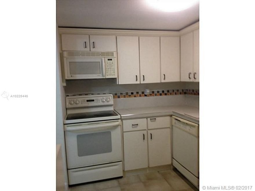 beautiful townhouse style apartment on kendall drive. Very well located, spacious. Each room has there own bathroom, washer and dryer included and balcony. You need for someone to get in the parking in order to enter.