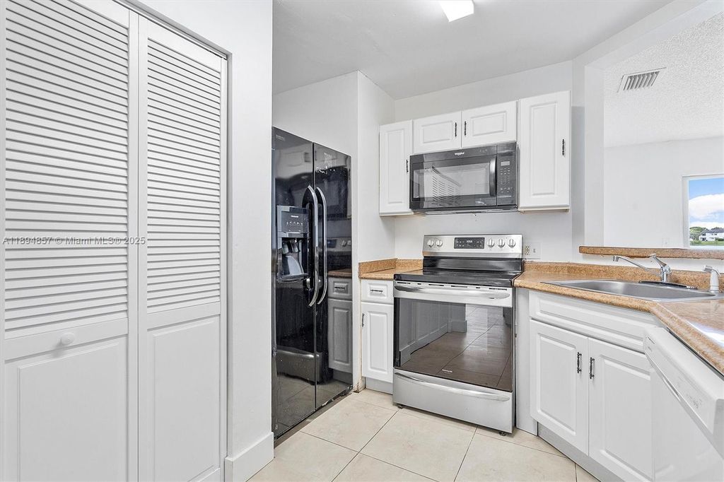 Photo of 3417 NW 44th St #103, Oakland Park, FL 33309 (MLS # A11894857)