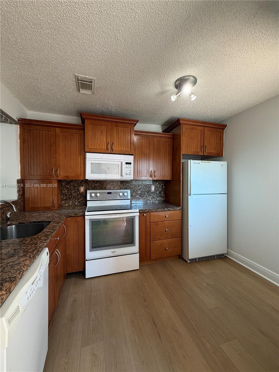 VILLA DORAL CONDO NO 5 - Residential Lease