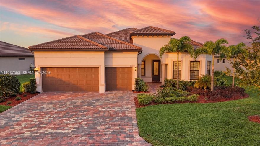 Experience Florida living in this meticulously upgraded estate on a quiet dead-end cul-de-sac with no homes across the street, offering rare privacy and stunning lake views. The sought-after southern rear exposure keeps your pool and spa sunlit all day without harsh afternoon heat indoors. A grand foyer opens to soaring ceilings, wood-look plank tile flooring, and custom craftsmanship throughout.

Guests enjoy a private ensuite bedroom, while a dedicated office with built-ins provides a refined workspace. The open-concept family room, kitchen, and dining area are ideal for entertaining, featuring a fireplace, custom woodwork, and a gourmet kitchen with a large island, premium appliances, designer backsplash, and custom lighting. Zero-corner sliders seamlessly connect to the covered lanai.

The spacious primary suite offers a custom accent wall and spa-like bath, with an additional guest bedroom for family. Plantation shutters, an upgraded laundry room, and an extended garage add functionality. Outdoors, enjoy a covered lanai pre-plumbed for a kitchen, plus a pool and spa overlooking the lake.

Located in River Hall Country Club, residents enjoy championship golf, a resort-style pool, fitness center, and more—just minutes from Fort Myers, RSW, and Gulf beaches.