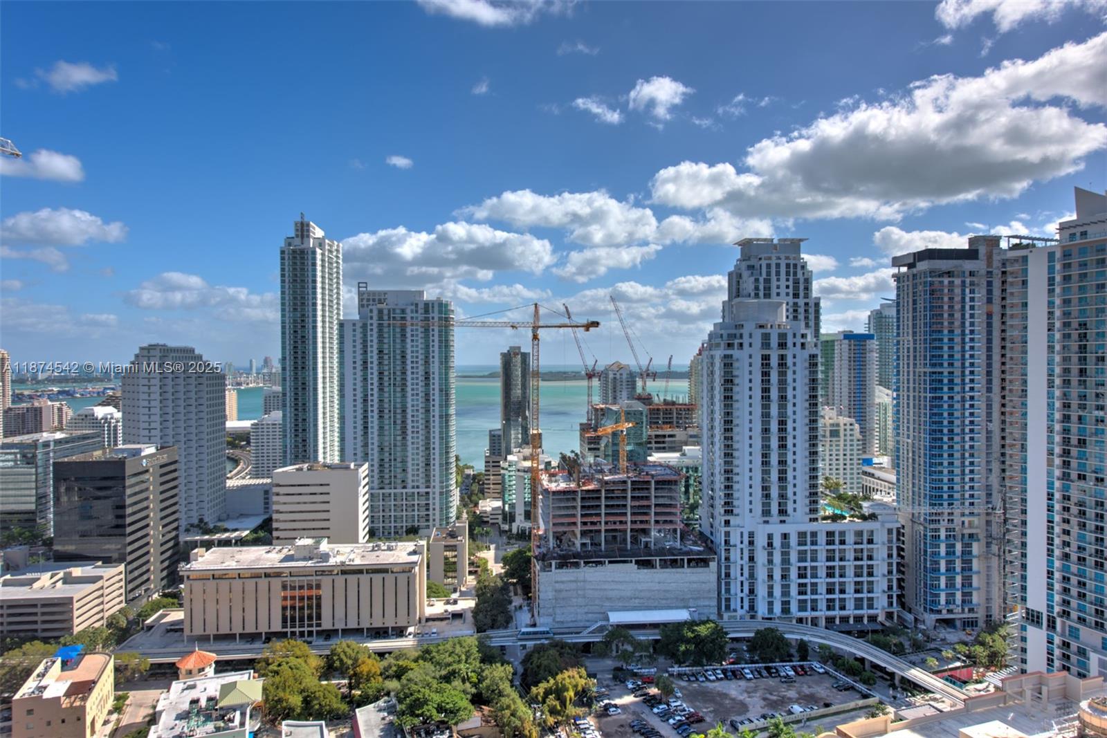 Beautiful 2 bedroom (+ den) PENTHOUSE unit at Nine with 2 parking spots and 10' ceilings! Wake up to the fabulous East view of the Bay and City. This is walking distance to everything- Mary Brickell Village, Publix, Metro Mover, etc.