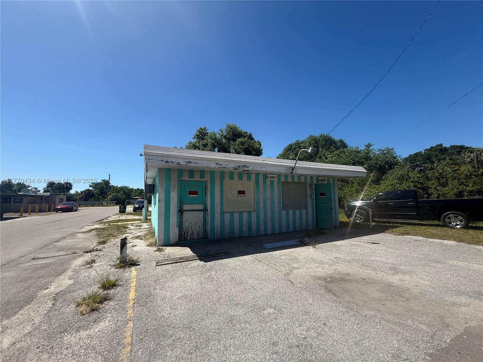 Discover the potential of this free-standing commercial building nestled on a 1,886 sq. ft. lot. Perfect for investors or business owners looking for a blank canvas, this property offers an exceptional chance to shape it to fit your vision.
Located in an Opportunity Zone, this property provides exciting potential for tax incentives and future growth. Inside, you'll find a collection of building materials (as shown in listing photos) included in the sale of the property, making your renovation process even smoother. Though in need of finishing touches, this space offers a strong foundation for a variety of commercial ventures.
Unlock the possibilities and bring your ideas to life in this dynamic location.