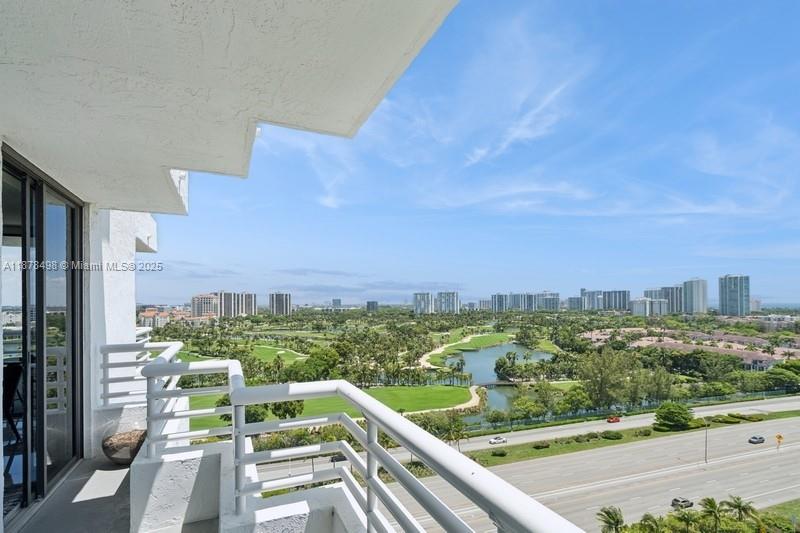 Introducing this amazing, spacious and freshly painted 2/2 corner unit condo on 17th floor with a wrap-around balcony, incredible panoramic views of golf course and ocean, in-unit washer/dryer, eat-in kitchen, an immense and open concept living/dining room, countless amenities, not to mention the newly upscaled, top tier designed lobby, 3 brand new modern elevators w/finger print recognition access for extra security, party room, a mini market, remodeled fitness center, 24/7 security, covered garage space plus valet parking, sauna, 2 heated lagoon-style pools, spa and a beach volley ball court. Short distance to the Aventura Mall, the Tunberry golf course, splash pad, Tennis, amusement Park, movie theater and many more.