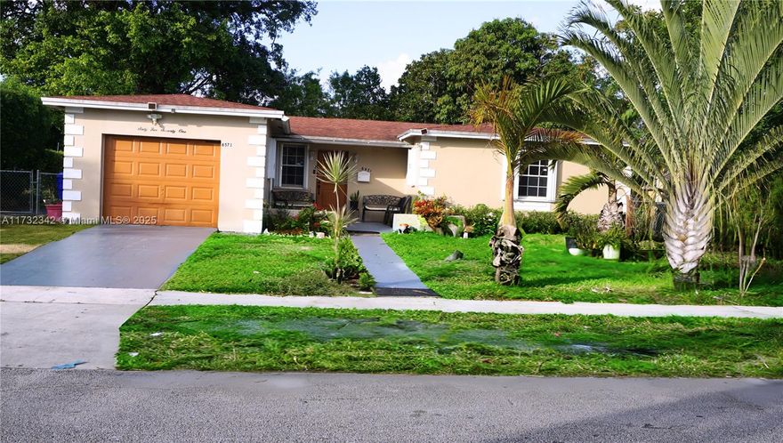 Beautiful and spacious 4-bedroom, 2-bathroom home featuring sleek tile flooring throughout and fully modernized bathroom. The modern kitchen shines with quartz countertops, ideal for hosting and entertaining guest. The inviting Florida Room opens directly to a large backyard, perfect for relaxation or entertaining with accordion hurricane shutters (2005). Enjoy the expansive yard with fruit trees, a storage shed, and tranquil waterfront views of the Stranahan River. Complete with a 1-car garage, this home combines comfort and style. More information Roof (2018), AC (2013), Water Heater (2010), Front Door (2020). Bring all offers