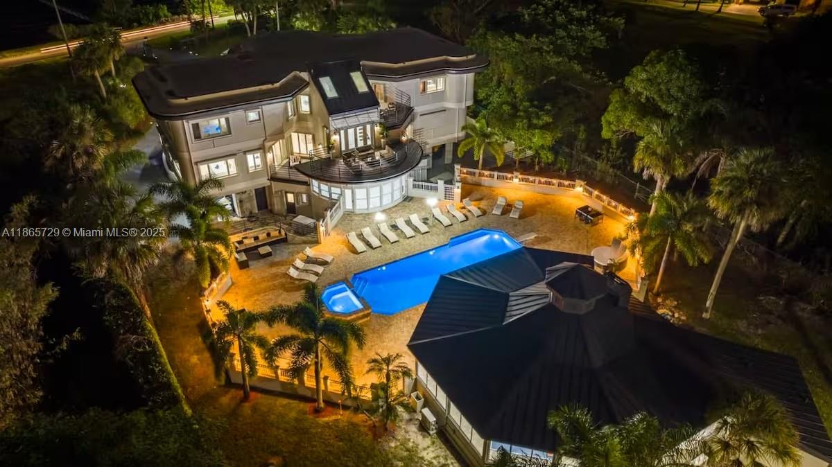 Welcome to your private retreat on the water! This incredible 3-story estate offers 10 bedrooms and 9 bathrooms, perfect for large families, groups, or entertaining guests. Enjoy stunning views and your own private dock for boating or fishing adventures. The home features multiple living areas, a pool with spacious lounging areas, and a separate back house ideal for playing games and hanging out. Sports lovers will appreciate the private pickleball court, while the expansive design offers room for everyone to relax and enjoy. Truly a one-of-a-kind rental combining comfort, fun, and Florida living at its best.