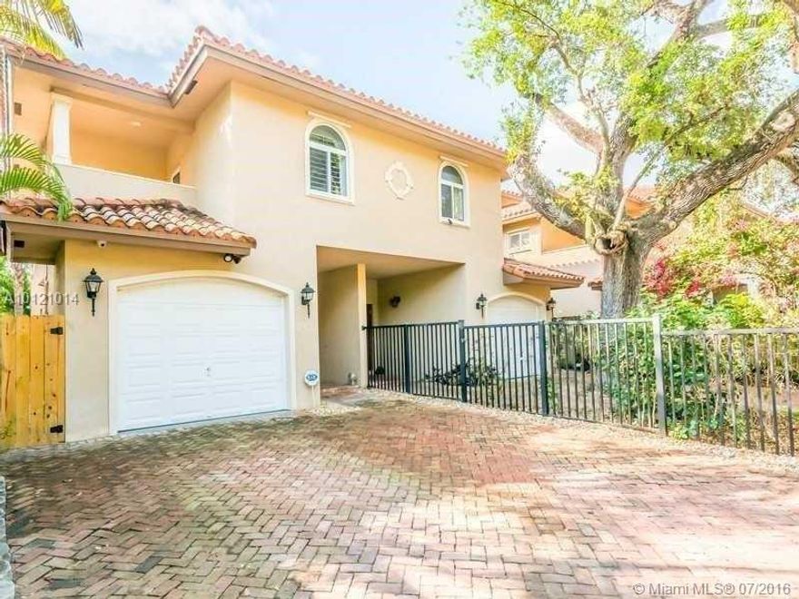 Coveted townhouse on Shipping Ave in the heart of Coconut Grove, within walking distance of Cocowalk. This gated home has upgrades for a comfortable lifestyle: marble floors, stainless steel appliances, granite counters, Italian cabinetry, summer kitchen, custom walk-in closets, built in entertainment center, high tech fully installed security camera system and much more. Within walking distance from the dog park, Kirk Tennis Courts, Fresh Market & more!