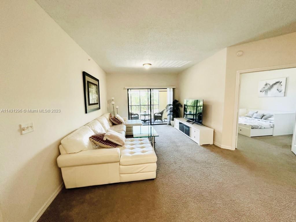 Photo of 2725 Anzio Ct #301, Palm Beach Gardens, FL 33410 (MLS # A11431296)