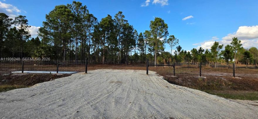 Discover the freedom and tranquility of this 1.25-acre retreat in Viking Estates—an adventurer’s dream surrounded by nature. Nestled among mature trees, this spacious lot is perfect for building your dream country home, ranch, or weekend getaway, with no HOA to limit your vision. The property is partial fenced, cleared, features a culvert, and includes a survey. Located just north of the expansive Kissimmee Prairie State Park, you’ll have access to over 100 miles of trails for hiking, cycling, and horseback riding. Whether for personal enjoyment, investment, or future development, this property offers remarkable opportunity. Zoning and land-use options may be confirmed with the county. For those seeking even more space, the adjacent lot is also available, offering the opportunity to combine both parcels for a total of 2.5 acres of peaceful country living.