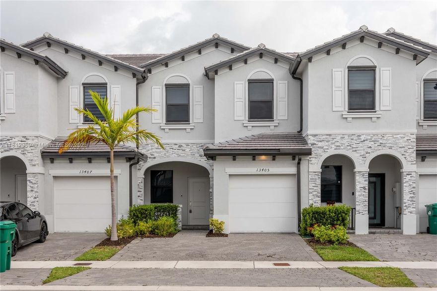 Like-new 2022 townhouse in exclusive Pine Vista. 3 beds, 2.5 baths, 1-car garage + 2 driveway spaces. Ceramic floors downstairs, waterproof laminate upstairs. Modern kitchen with tall white cabinets & stainless steel appliances. Fiber optic internet, tankless water heater, washer/dryer, hurricane panels. Fenced patio perfect for relaxing. Resort-style clubhouse with pool, kids' splash park & full gym. Prime location near A+ schools, Baptist Hospital, Homestead Air Base, shops, restaurants & Turnpike.