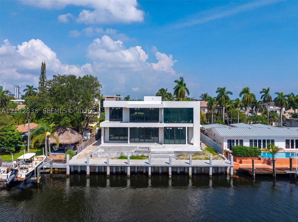 Photo of 1612 SE 14th St, Fort Lauderdale, FL 33316 (MLS # A12112838)
