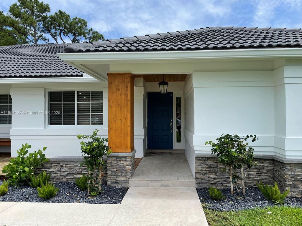 Photo of 9305 Old Pine Rd, Boca Raton, FL 33428 (MLS # A11858927)