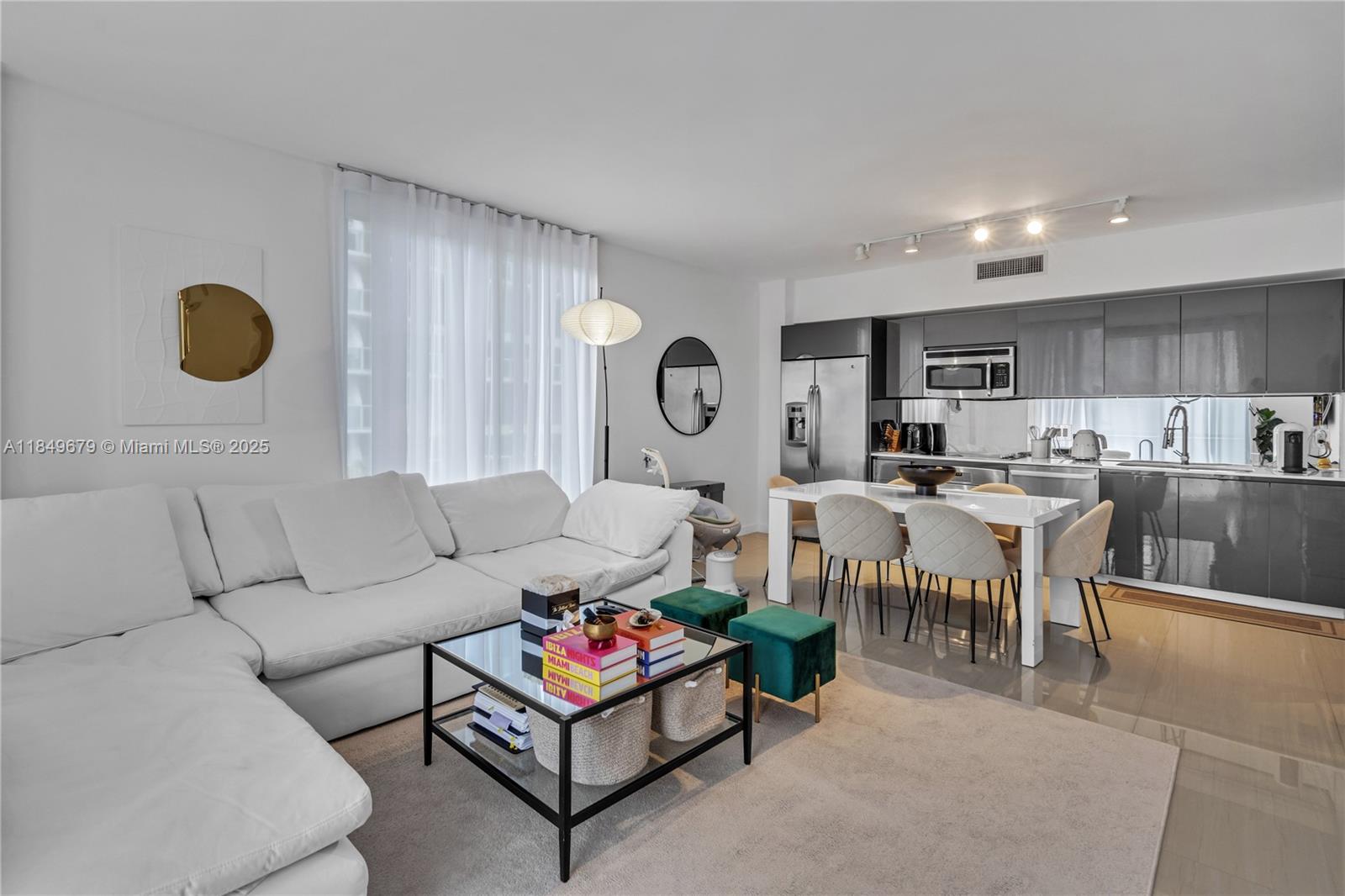 Discover this stunning 2-bedroom, 2-bath apartment in My Brickell. The modern kitchen features sleek stainless steel appliances paired with elegant Italian cabinetry, and you'll appreciate the convenience of an in-unit washer and dryer. Water and basic cable are included through the condo association, ensuring hassle-free living. The building boasts exceptional amenities, including a rooftop pool, hot tub, clubroom, and fitness center. Ideally located just across from Brickell City Centre, this home offers unparalleled access to the best the neighborhood has to offer.