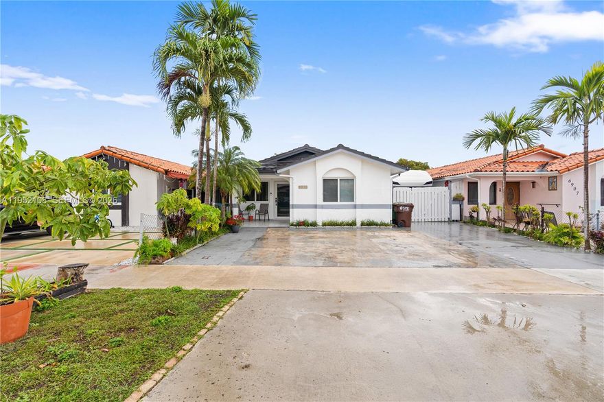 Beautiful single-family home in quiet family-oriented neighborhood! NO ASSOCIATION.  3/2 plus den that can be used as an office or room, Impact windows throughout, porcelain floors, open kitchen with stainless steel appliances, roof and AC like new, replaced in 2023, upgraded bathrooms, and more! Centrally located with quick access to both, Palmetto expressway and turnpike, close to schools, places of worship, restaurants, shopping and Palmetto Hospital. Must see!