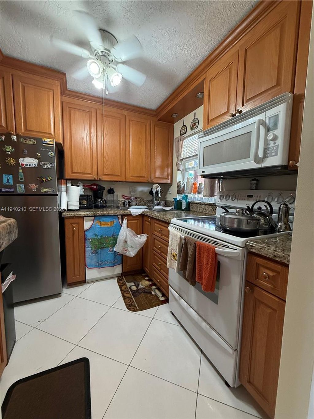 Photo of 9041 Sunrise Lakes Blvd #207, Sunrise, FL 33322 (MLS # A11940210)