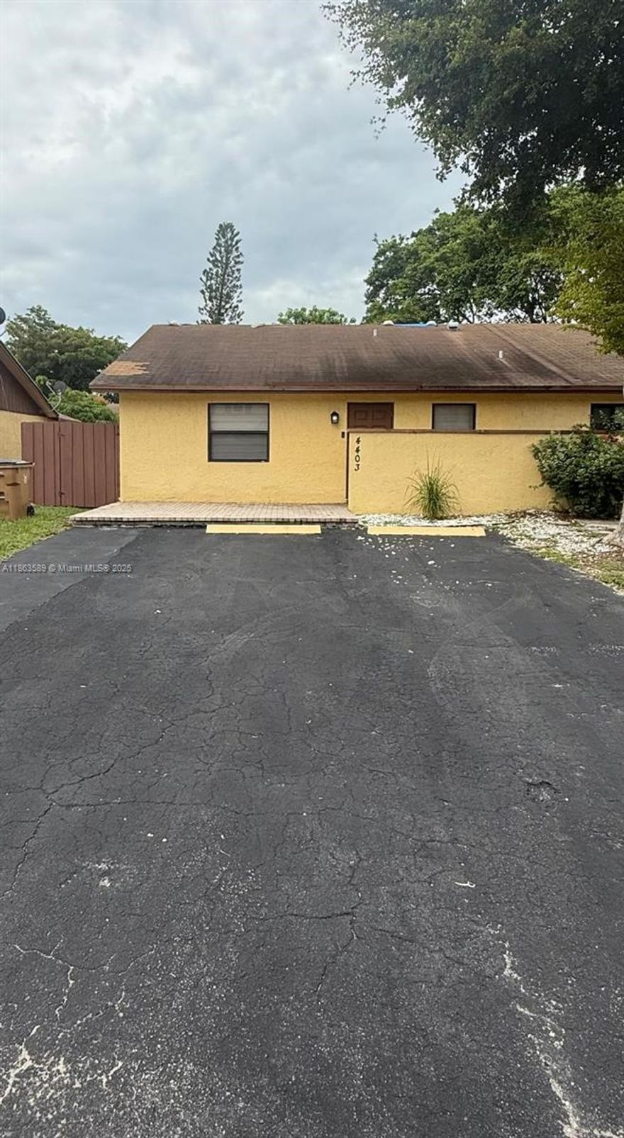 Renovated move-in ready 3 bedroom/2 bathroom, with granite countertops and SS appliances, hurricane Impact windows and doors, fenced-in backyard with outdoor kitchen and 1 of the room has it's own entryway.  Laundry room with washer and dryer included, nice paver front and back patios. Ceramic tile throughout, ample private driveway for 4 cars. Offers Community Clubhouse with pool, jacuzzi, tennis court, ping pong and more. Lots of room to entertain family and friends. Close to shops and the beach, and easy access to both I-95 and The Turnpike.