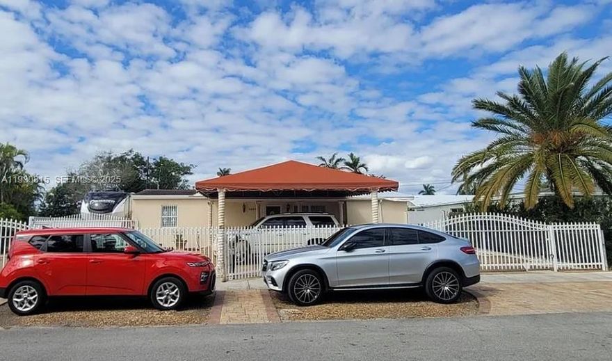 Please contact listing agent for showing and information - 2/1 fenced house with plenty of parking spaces to accommodate multiple cars and side yard.  Central A/C and newly updated kitchen and bathroom.