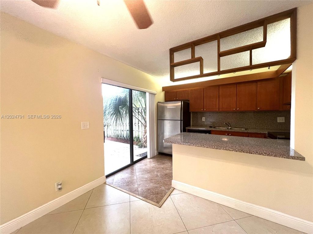 Photo of 246 Woodland Rd #246, Palm Springs, FL 33461 (MLS # A12024791)