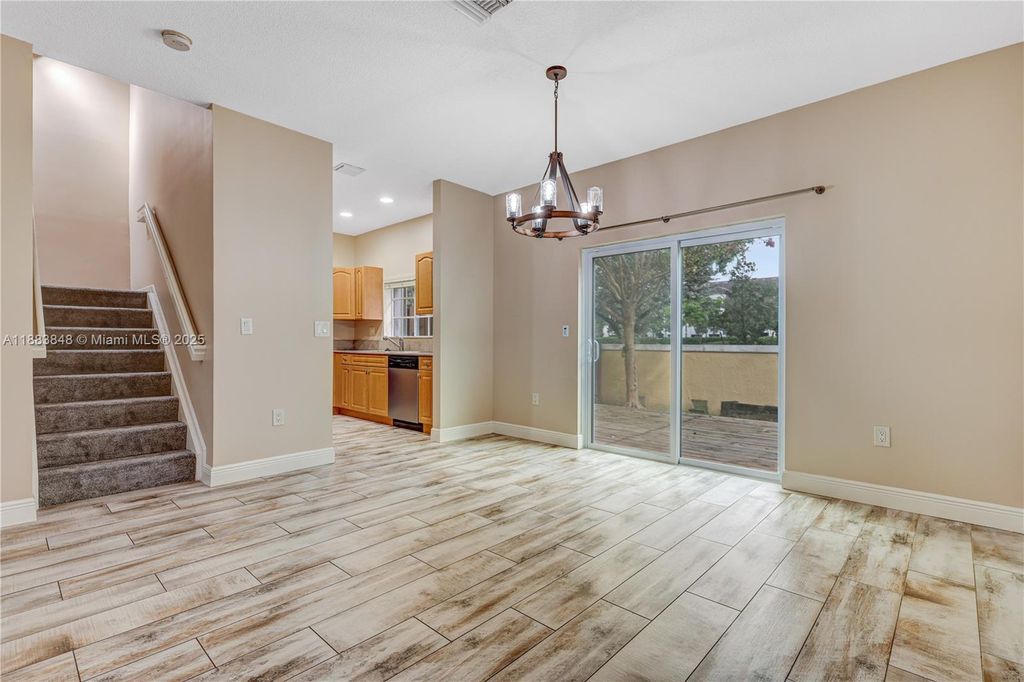 Photo of 7627 N Stonecreek Cir, Davie, FL 33024 (MLS # A11883848)