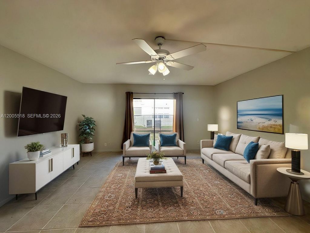 Photo of 3162 Coral Springs Dr #4, Coral Springs, FL 33065 (MLS # A12005518)