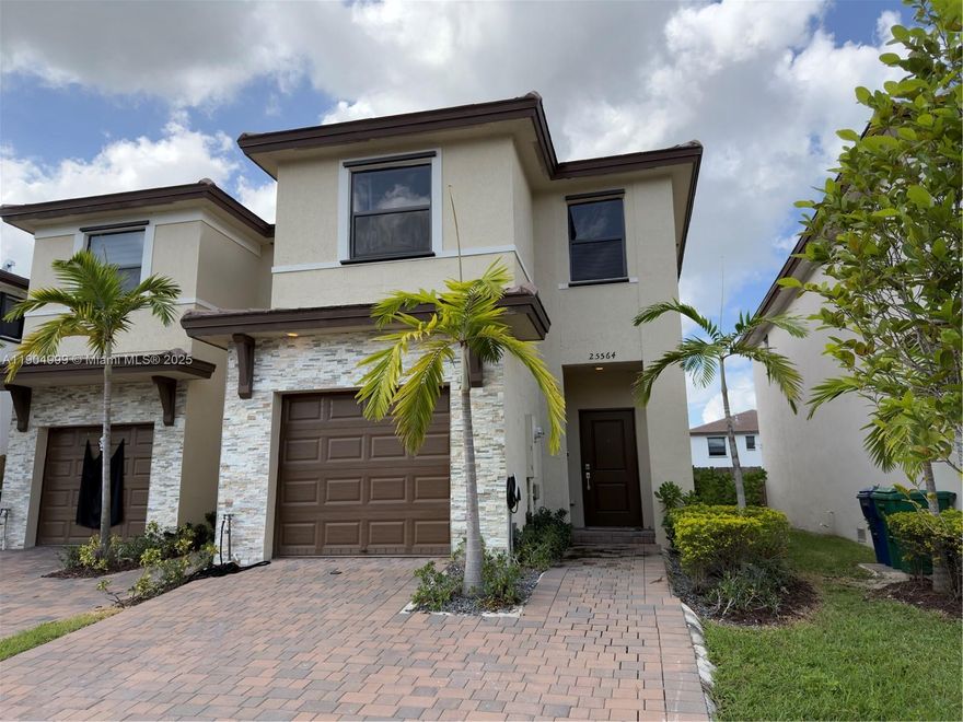 Modern living at its finest! This stunning 2022 two-story home features 3 spacious bedrooms, 2.5 baths, a 1-car garage with TESLA charger, and a large patio perfect for relaxing or entertaining. Enjoy sleek modern finishes, stainless steel appliances, a reverse osmosis water system, and bright, natural light throughout. Stay cool with central A/C and unwind in generously sized bedrooms. Community perks include a sparkling pool and fully equipped gym! Prime location near top schools, shopping, dining, and major conveniences.