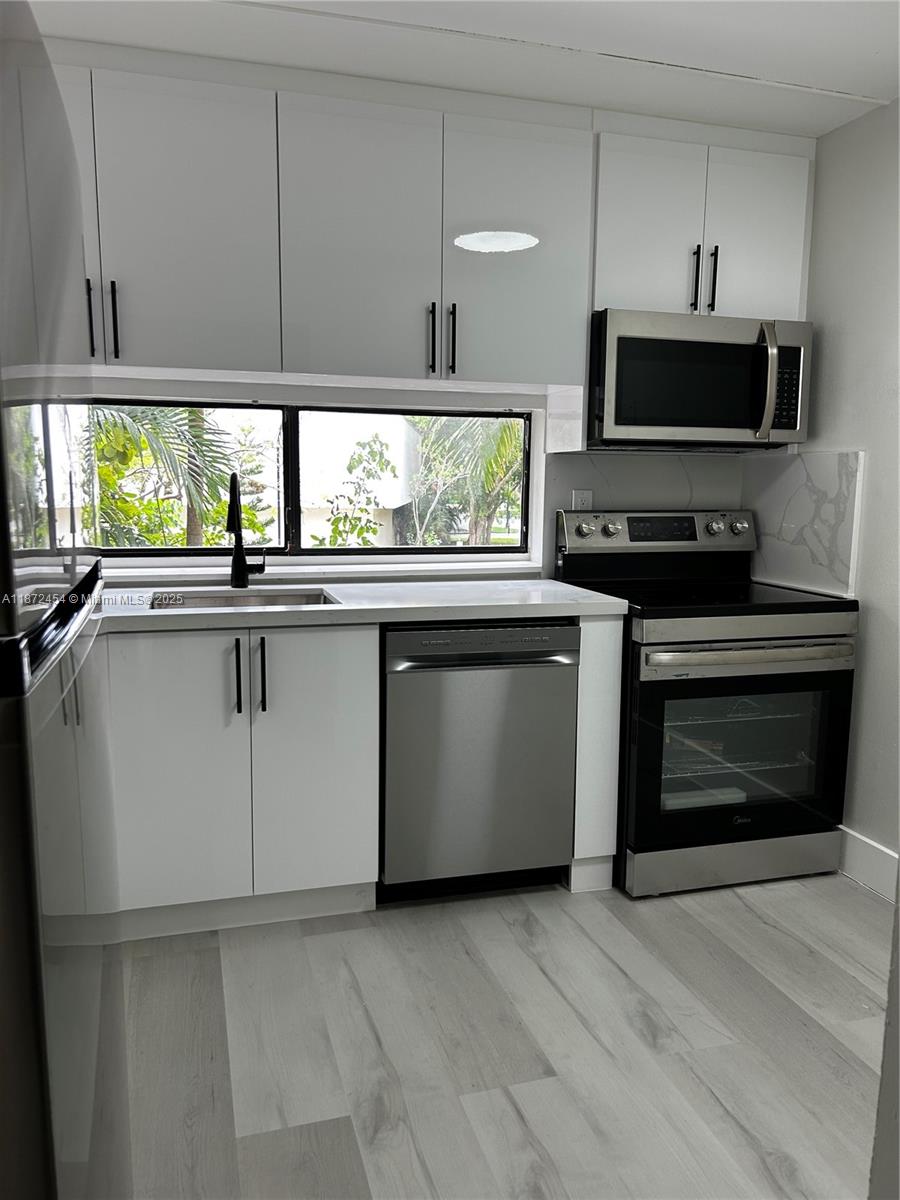 PLAZA OF AMERICAS CONDO P - Residential