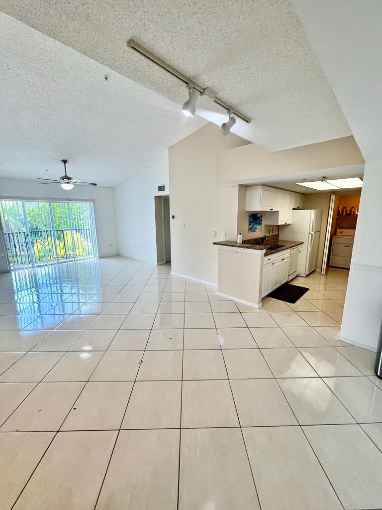 Rare 3 bedroom 2 bath unit located in the well maintained Grand View at Crestwood complex. Third floor unit with vaulted ceilings. Tiled floors in the rooms, no carpet! Masters has a walk in closet. The gated community offers resort-type amenities such as two pools, fitness center and tennis courts and two tot lots. Centrally located between Southern and Okeechobee Blvd. near Turnpike, Wellington, dining, and shoppes and pediatric dedicated ER. Nest Thermostat and August smart lock installed high tech apt. Available now! Lease to own option available as well.