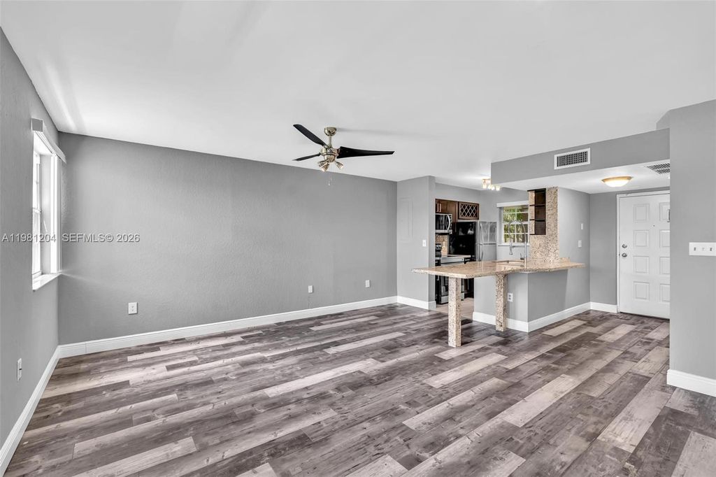 Photo of 2871 N Oakland Forest Dr #204, Oakland Park, FL 33309 (MLS # A11981204)