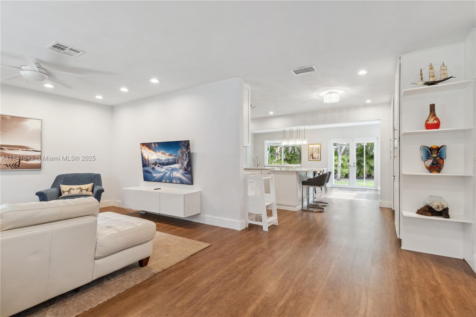 Welcome home to Palmetto Bay! This charming home is situated on a spacious 15,000+ square foot lot, offering both comfort and style. With over 1,600 square feet of living space, it features an open floor plan that maximizes the flow of natural light through the home. The interior boasts modern farmhouse details, including stylish finishes and a beautifully updated kitchen. The property includes a cozy living area, a dining space that invites gatherings and the expansive backyard provides plenty of room for outdoor activities, landscaping, or potential expansions. The roof and hurricane impact windows were replaced in 2017, giving the new owners peace of mind and sense of security for years to come. The single car garage is very wide and has plenty of room. Buyers agents are welcome!