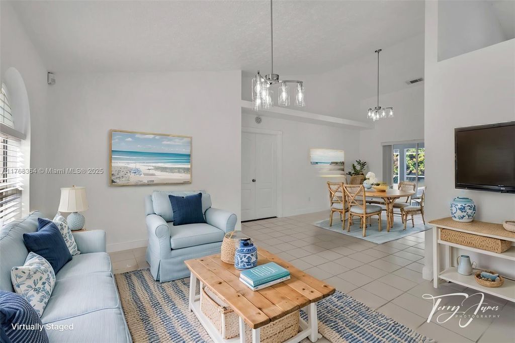 Photo of 1321 SE Airoso Blvd, Port Saint Lucie, FL 34983 (MLS # A11768364)