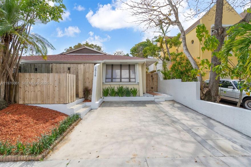 Fully upgraded and move-in ready 2-bedroom, 2-bath half duplex in highly desirable Coconut Grove. This beautifully renovated home was completely updated in 2020, including a new roof (October 2020), offering peace of mind and modern comfort throughout.
Step inside to an open-concept floor plan with soaring high ceilings that create a bright and airy living space. The updated kitchen features granite countertops, stainless steel appliances, and ample cabinetry — perfect for everyday living and entertaining. Spanish tile flooring runs throughout the home, adding warmth and character.
Both bathrooms were fully renovated with new vanities, shower, tub, and toilets. Electrical system has been completely redone, including panel, outlets, switches, and lighting fixtures.
Enjoy outdoor living in your private, fully fenced backyard featuring tile and artificial turf for low-maintenance upkeep. Additional features include a Wyze outdoor floodlight system and a termite tent treatment completed in 2020.
No HOA, no maintenance fees, and no approval process required.
Note: Shed is excluded from the sale.