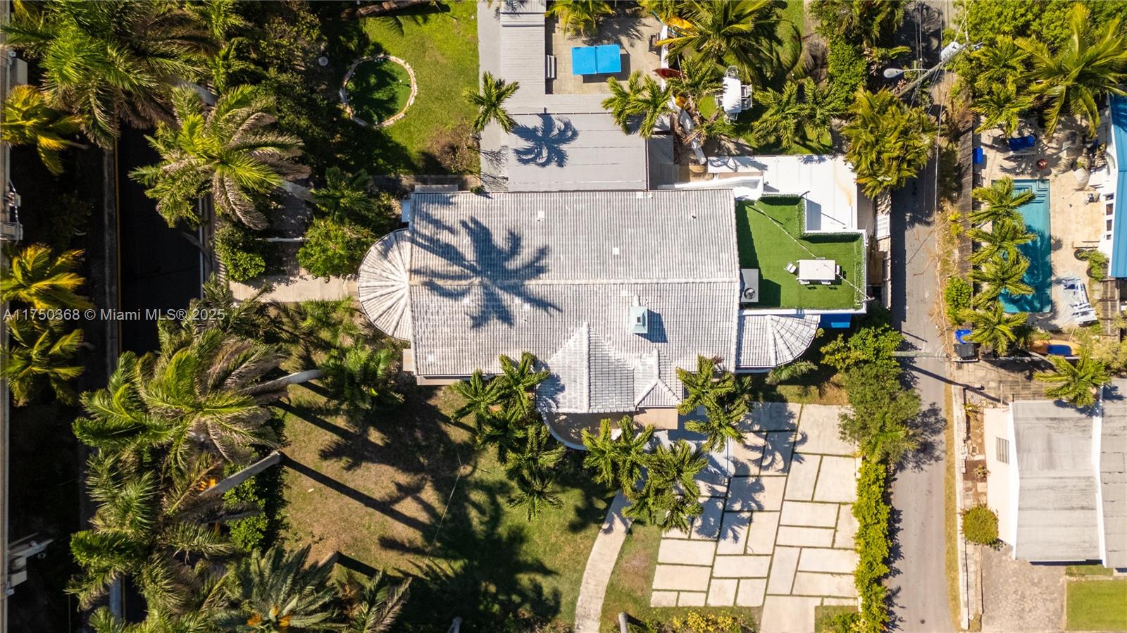 Prime location meets unparalleled charm at 701 Hollywood Blvd. This unique home offers amazing canal views and is the closest residence to the bridge leading to S Ocean Drive and the Hollywood Boardwalk. Enjoy a spacious backyard with a large above-ground pool, patio deck for outdoor dining, and a private mini golf course. A rooftop terrace provides the perfect setting for romantic dining with waterfront canal views. The attached in-law suite with a separate entrance is ideal for guests or family. Don't miss this exceptional opportunity in a sought-after location!
