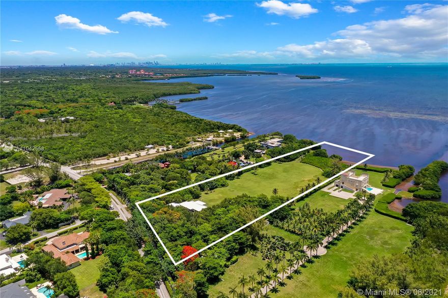 BAYFRONT RETREAT BEYOND EXPECTATIONS. Unique and hard to find 6.38+ Acres (277,913) waterfront Estate, with 330 linear feet exposure with wide views of Biscayne Bay. Located directly on historic Old Cutler Road, includes a totally renovated (2017) guest house (3 bedrooms + 2 baths) as well as a covered two car garage. The new proposed main residence was designed by local architects Ralph-Levy. The land offers plenty of space, privacy, a fresh water spring, fruit trees, and local fauna as well as a convenient canoe/ kayak ramp and water well. Ideally located minutes from two major airports, top rated schools, convenient shopping and  South Miami-Coral Gables urban centers. Rare offering, Real Seller.