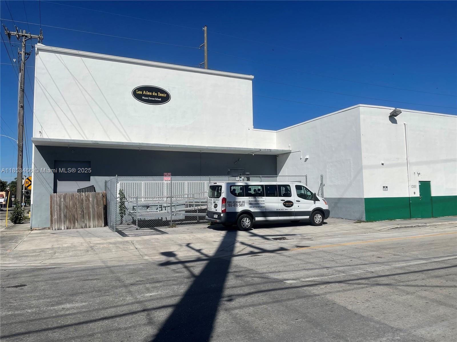 Welcome to Allapattah! This former ice factory w/a combined 15,000 SF +/- warehouse sits on a 17,493 SF corner lot of a wide one-way street that is destined to be the main thoroughfare of this exploding district. The building currently consists of 2 easily combinable sections. Space #1 is +/-5,000 SF performing arts studio w/soaring +/- 28’ ceilings that was completely renovated w/new A/C, Electric, Bathrooms, Floors, Lighting & loading dock & currently a circus school. Space #2 is 10,000 SF +/- w/15’ ceilings of mostly wide-open space w/2 offices, a dock height loading dock & an oversized street loading door providing easy access for trucks & deliveries. W/proximity to Wynwood & the Medical Corridor it is uniquely positioned to become the cornerstone of the next great neighborhood.