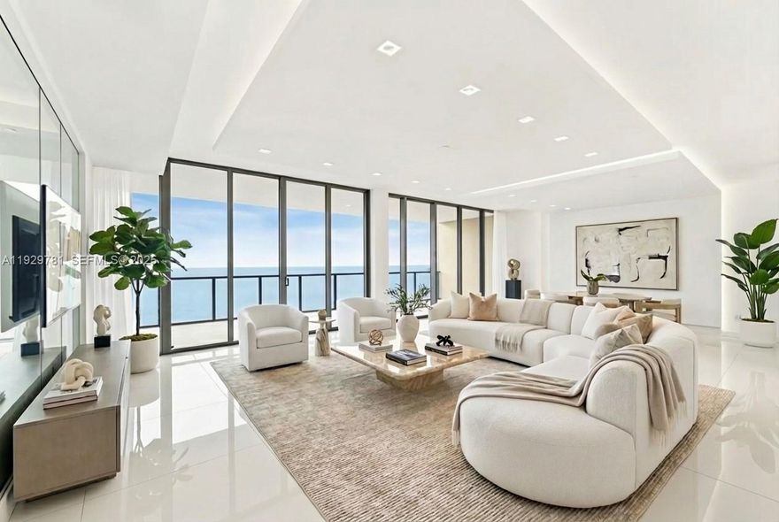 Experience refined beachfront living at the prestigious St. Regis Bal Harbour. This 4-bed, 5.5-bath residence spans 3,556 SF, offering panoramic ocean and bay views. Enter through a private elevator foyer to a bright, open layout where the living area seamlessly transitions into the dining room and a well-appointed kitchen with ample cabinetry and a walk-in pantry. Enjoy direct ocean views from the living space and a versatile office area. The bayside primary suite features balcony access with stunning views and a marble bathroom with a spacious shower and tub. Dine & lounge on 2 expansive balconies. Located across from Bal Harbour Shops, enjoy white-glove service, hotel amenities, 24-hour concierge, restaurant and bar, beach and pool services, and a state-of-the-art gym and spa.