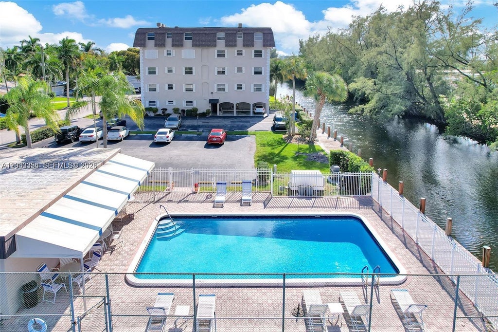 Photo of 5911 NE 14th Ln #205S, Fort Lauderdale, FL 33334 (MLS # A12030354)