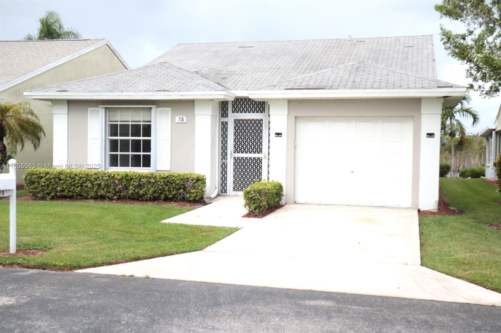 Beautiful 2BR/2BA home with a 1 car garage in the gated North Gate Community of Homestead, offering serene lake views from your covered back porch. Enjoy elegant porcelain tile floors, a quartz waterfall island, 4 stainless steel appliances, and a modern washer/dryer. The spacious primary suite boasts a huge walk-in closet. Rent covers basic cable, internet, and landscaping, plus resort-style amenities—pool, gym, and clubhouse—so you can live, relax, and play with ease.