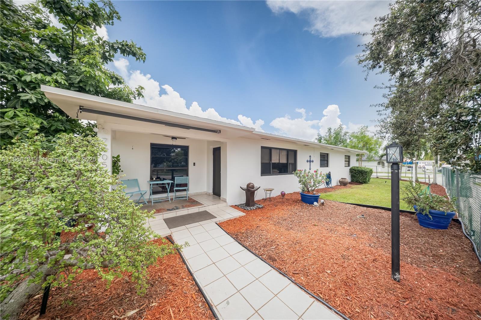 Welcome to this beautifully maintained 4-bedroom, 3-bath single-family home located in the desirable Amelia District neighborhood. Offering 2215 sq. ft. of comfortable living space, this spacious residence includes a versatile in-law quarter perfect for extended family or guests. Enjoy peace of mind with a newer roof installed just two years ago. With no HOA, you'll have the freedom to make this home your own, truly. Tile flooring throughout, generous closet space, and a covered terrace ideal for relaxing or entertaining. Situated close to top-rated schools, parks, shopping, dining, and major highways.